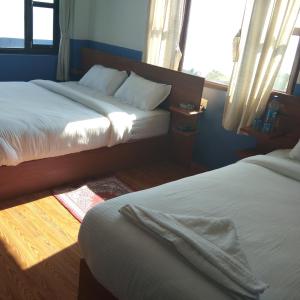 Postel nebo postele na pokoji v ubytování Good Hotel