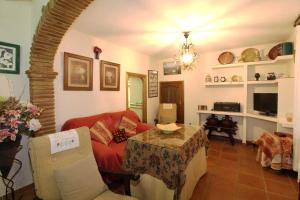 TV a/nebo společenská místnost v ubytování Casa rustica Mijas Pueblo