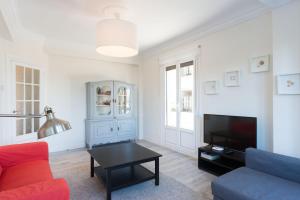 Televízia a/alebo spoločenská miestnosť v ubytovaní Atlantic - Iberorent Apartments