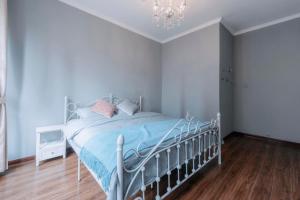 Una cama o camas en una habitación de Xi'an Lianhu·Moslem Street (Huimin Jie)· Locals Apartment 00172050