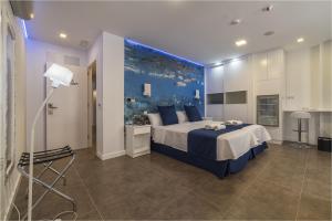 Cama o camas de una habitación en Hotel Ciudad del Mar