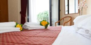 Katil atau katil-katil dalam bilik di Parc Hotel