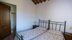 A bed or beds in a room at La Casa del Contadino Még 15 kép