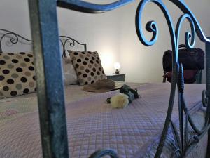 Posteľ alebo postele v izbe v ubytovaní Agriturismo Palazzo Conti - B