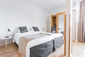 Ένα ή περισσότερα κρεβάτια σε δωμάτιο στο Hotel Spekeröd