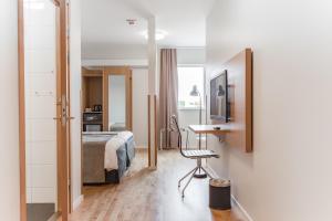 Ένα ή περισσότερα κρεβάτια σε δωμάτιο στο Hotel Spekeröd