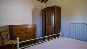 A bed or beds in a room at La Casa del Contadino