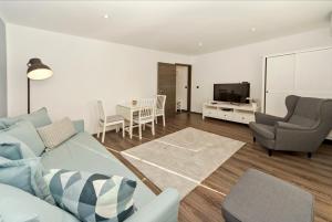 TV a/nebo společenská místnost v ubytování RÉS Apartman