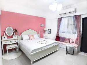 Postel nebo postele na pokoji v ubytování Lovi Time B&B