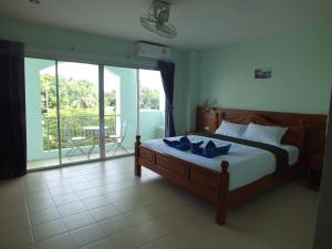 Billede fra billedgalleriet på saithong guesthouse i Rawai Beach + 23 billeder