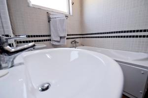 Koupelna v ubytování Hotel Lubjana