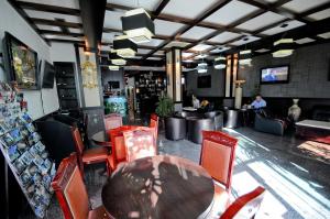 TV a/nebo společenská místnost v ubytování Hotel Lubjana