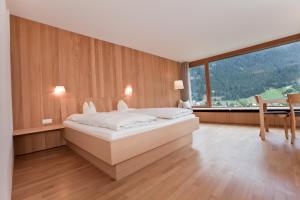 Rúm í herbergi á Bio-Hotel Saladina