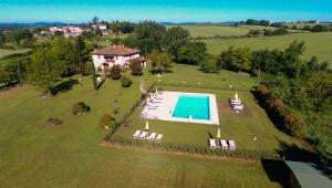 The swimming pool at or close to La Casa del Contadino