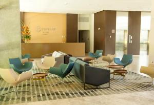 The lounge or bar area at Hotel Estelar Square