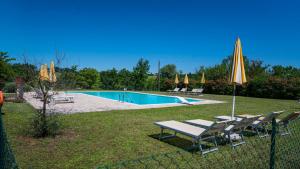 The swimming pool at or close to La Casa del Contadino