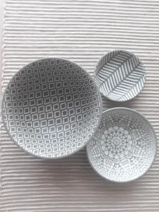 two plates sitting on top of a table at The Coral Door in Vereeniging +3 photos