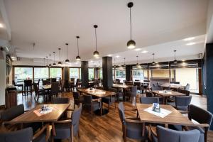 Reštaurácia alebo iné gastronomické zariadenie v ubytovaní Penzion Almada