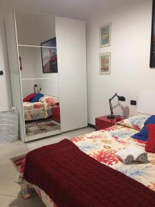 En eller flere senge i et værelse på Triglia + 6 billeder