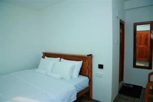 Ένα ή περισσότερα κρεβάτια σε δωμάτιο στο AGP home