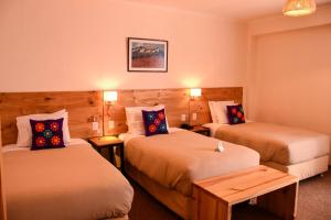Cama ou camas em um quarto em Cooper Hotel Boutique