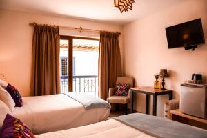 Cama ou camas em um quarto em Cooper Hotel Boutique