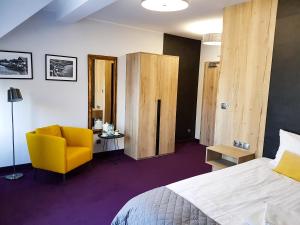 Posteľ alebo postele v izbe v ubytovaní Apartamenty PORTO