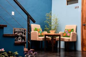 Uma área de estar em Cooper Hotel Boutique