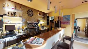 Kuchyň nebo kuchyňský kout v ubytování Čuček Guesthouse