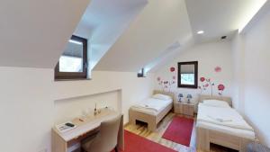 Postel nebo postele na pokoji v ubytování Čuček Guesthouse