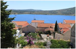 a view of a town with a large body of water at Holiday Home Ante in Primošten