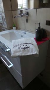 Łazienka w obiekcie Apartament Angelo