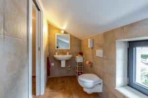 Koupelna v ubytování Apartment Li + 37 fotografií