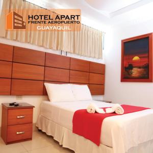 Postel nebo postele na pokoji v ubytování Hotel Apart Guayaquil Aeropuerto