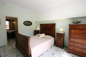 Postel nebo postele na pokoji v ubytování Sorrento Inn Guesthouse