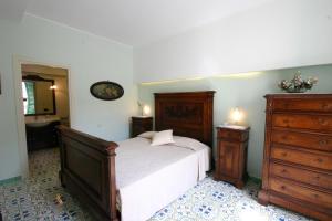 Postel nebo postele na pokoji v ubytování Sorrento Inn Guesthouse