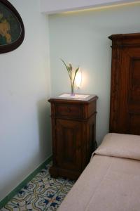 Postel nebo postele na pokoji v ubytování Sorrento Inn Guesthouse