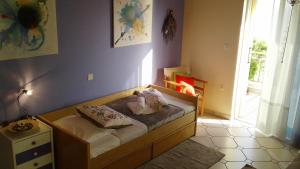 Postel nebo postele na pokoji v ubytování Villa "Eva" - Entire beachfront holiday home - 4S