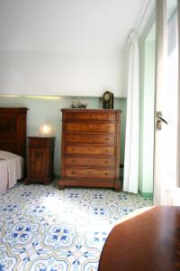 Postel nebo postele na pokoji v ubytování Sorrento Inn Guesthouse