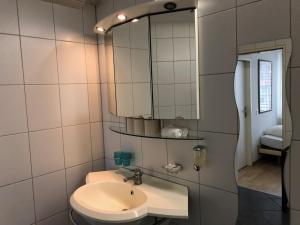 Vannituba majutusasutuses SASS APARTHOTEL