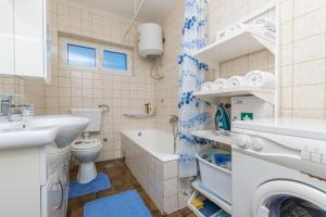 Koupelna v ubytování Apartments Slavomir