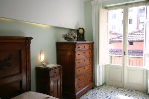 Postel nebo postele na pokoji v ubytování Sorrento Inn Guesthouse