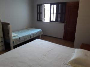 Кровать или кровати в номере Vila Orazio
