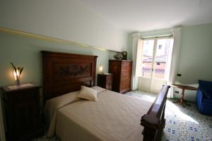 Postel nebo postele na pokoji v ubytování Sorrento Inn Guesthouse