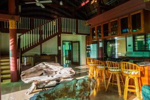 Area soggiorno di Samoan Highland Hideaway