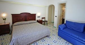 Postel nebo postele na pokoji v ubytování Sorrento Inn Guesthouse