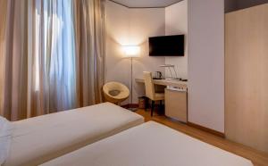 Postel nebo postele na pokoji v ubytování Best Western Plus Hotel Expo