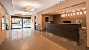 a large room with a large counter and a large window at Best Western Cowichan Valley Inn in Duncan