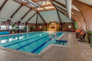 a large swimming pool with a large indoor swimming pool at Lagoon 737C in Frisco