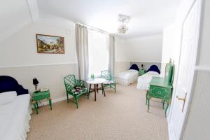 Posteľ alebo postele v izbe v ubytovaní Hotel Garden